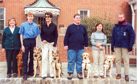 Here I am with Handley among my Seeing Eye classmates, their guide dogs and our instructor, Australian Peter Tomlins, January 2001
