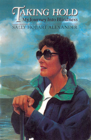 This cover is a portrait of me, hands on my cane, with a lake and mountains in the background.